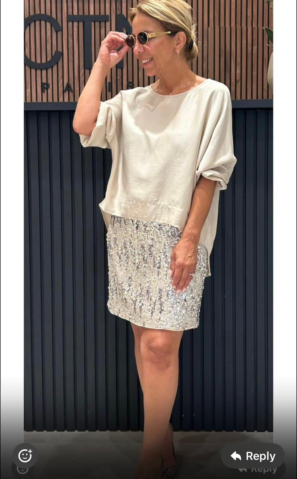 Sheer blouse and sequin skirt set