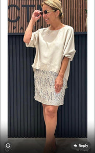 Sheer blouse and sequin skirt set