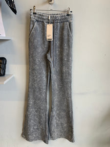 Acid wash fitted flared trousers