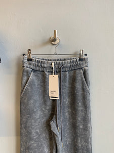 Acid wash fitted flared trousers