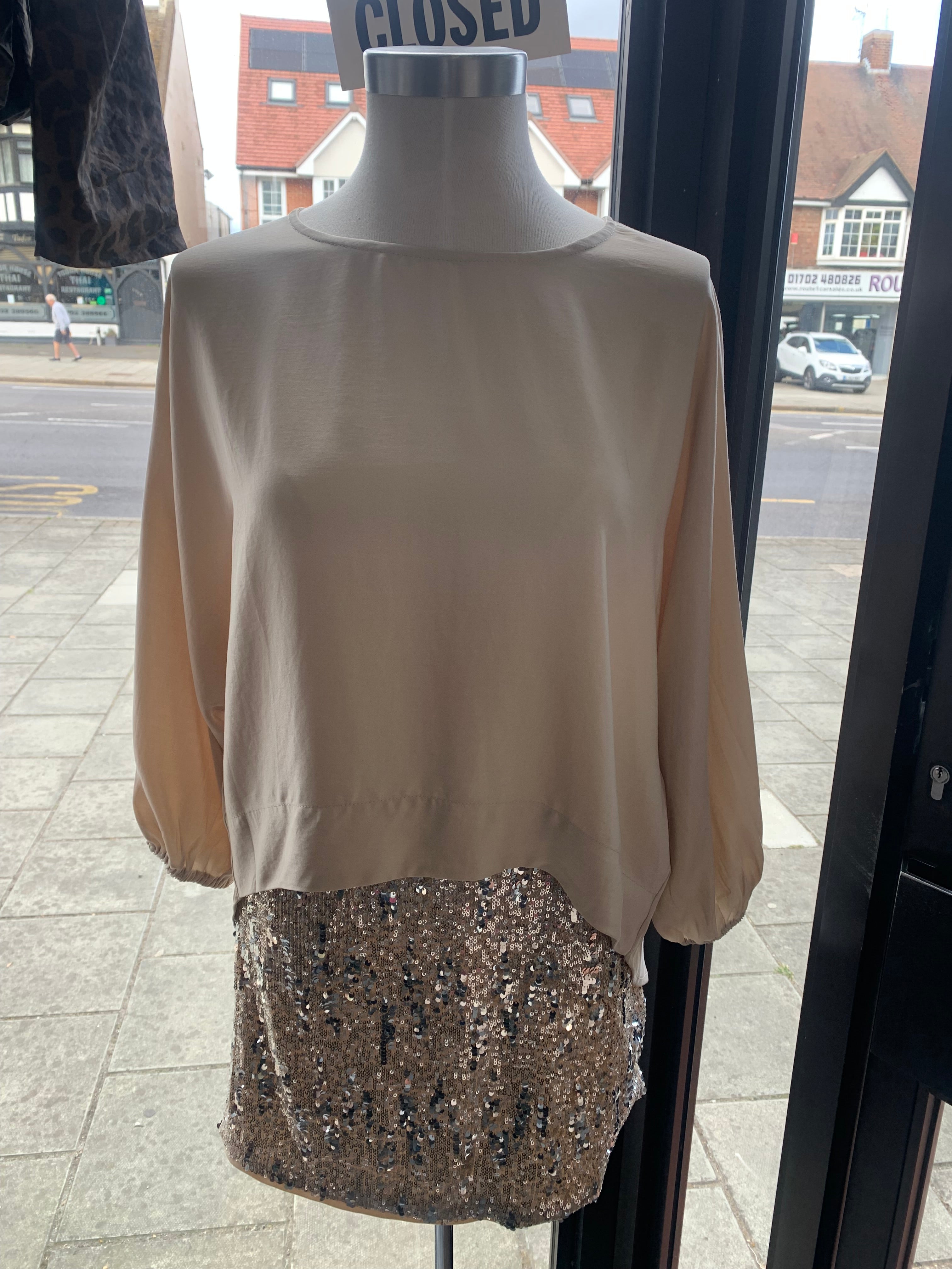 Sheer blouse and sequin skirt set