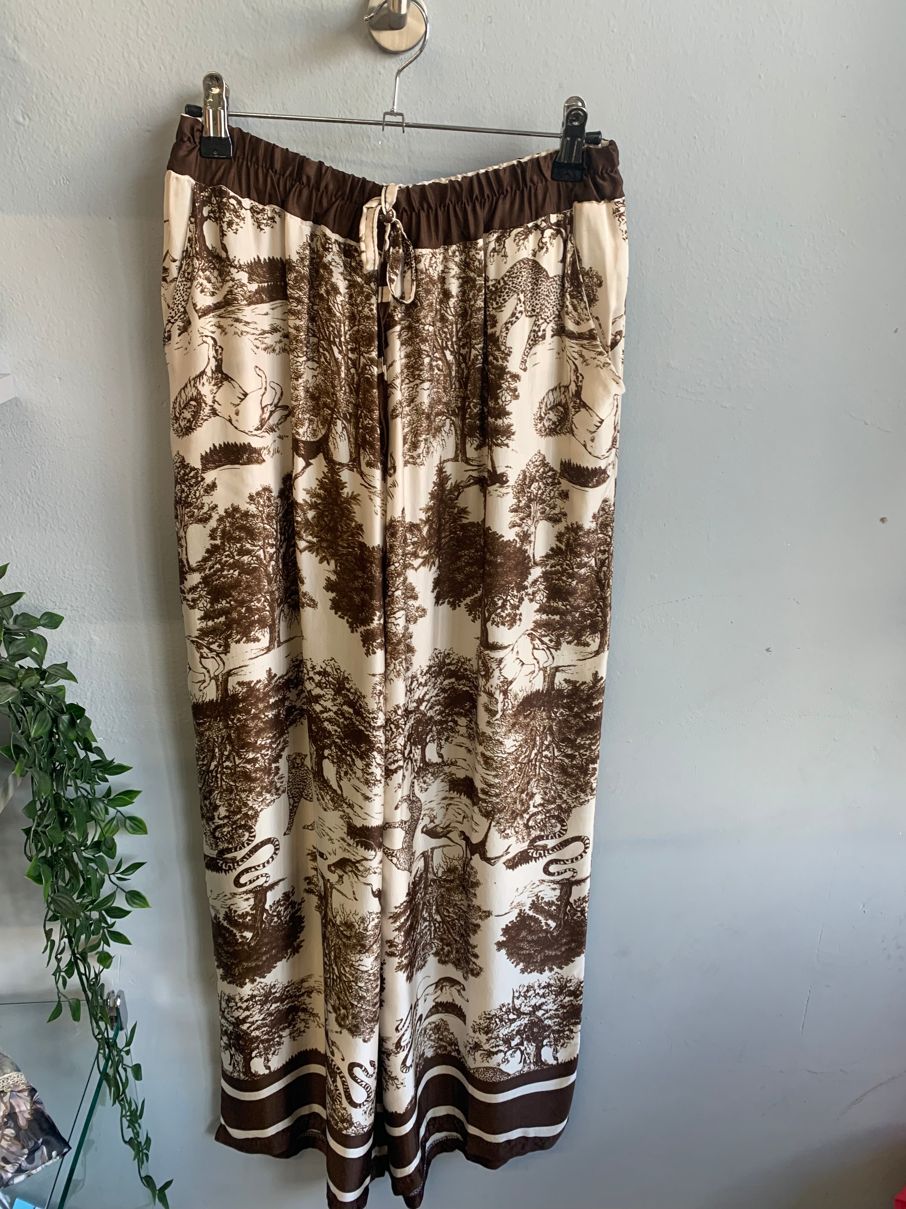 Safari print blouse and trouser set.