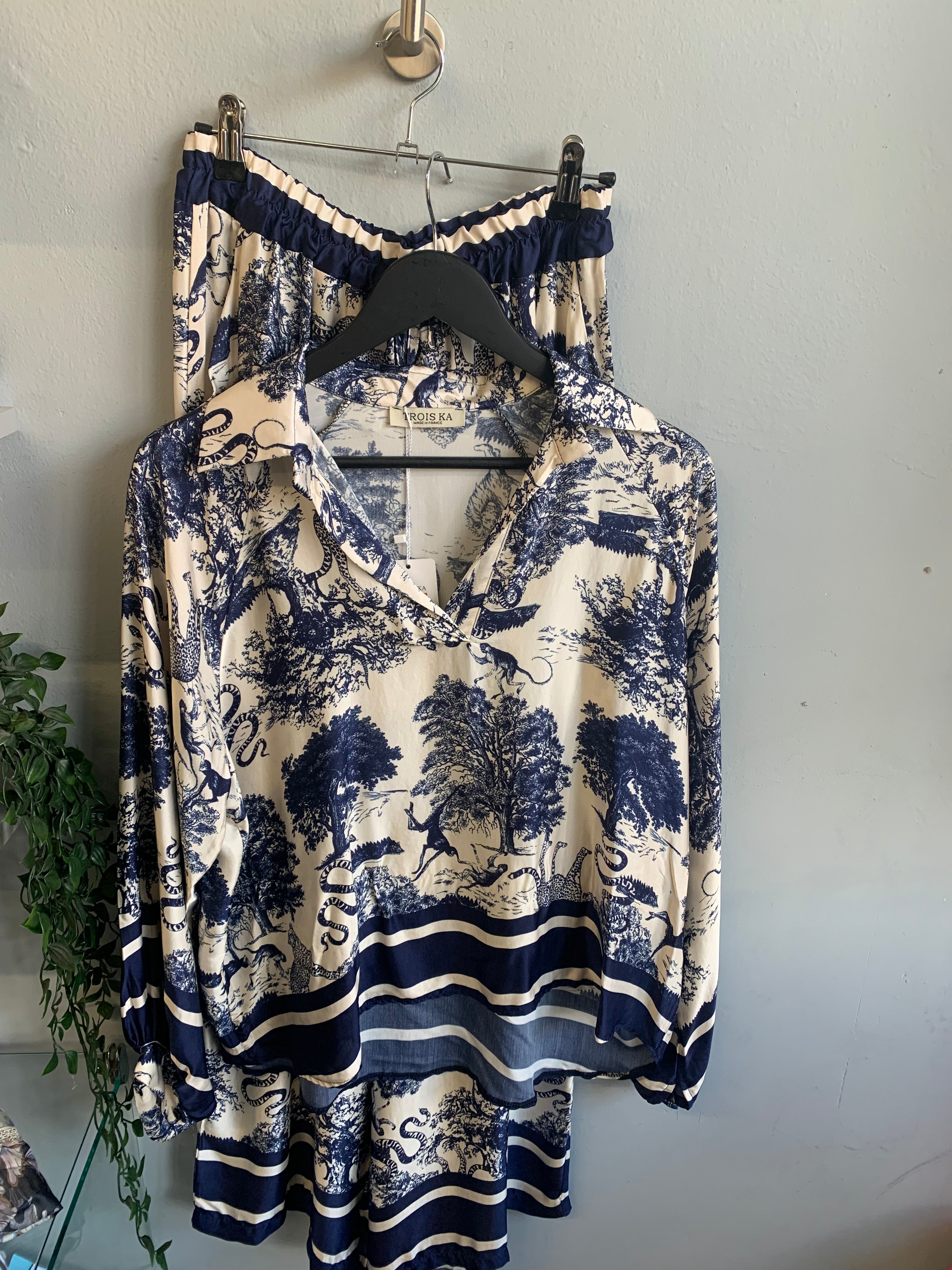 Safari print blouse and trouser set.