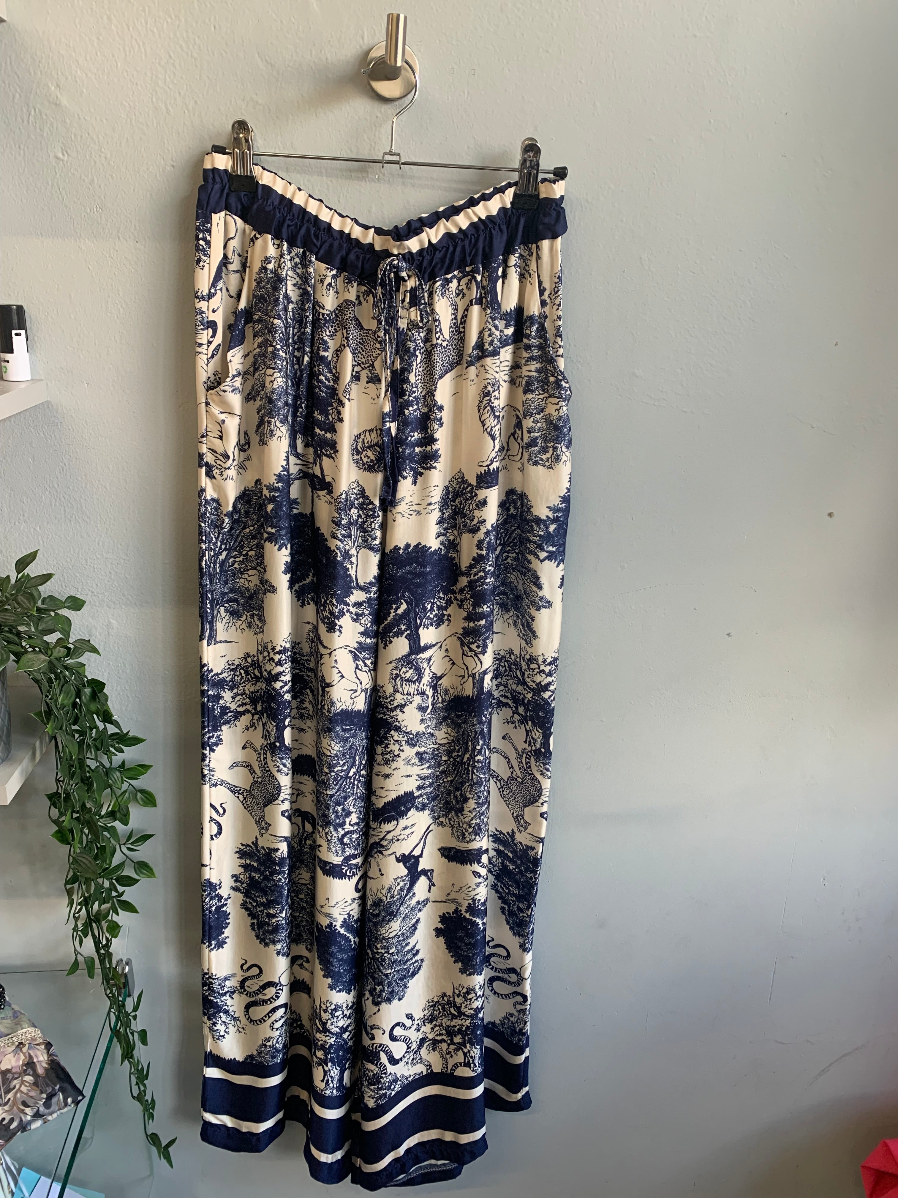 Safari print blouse and trouser set.