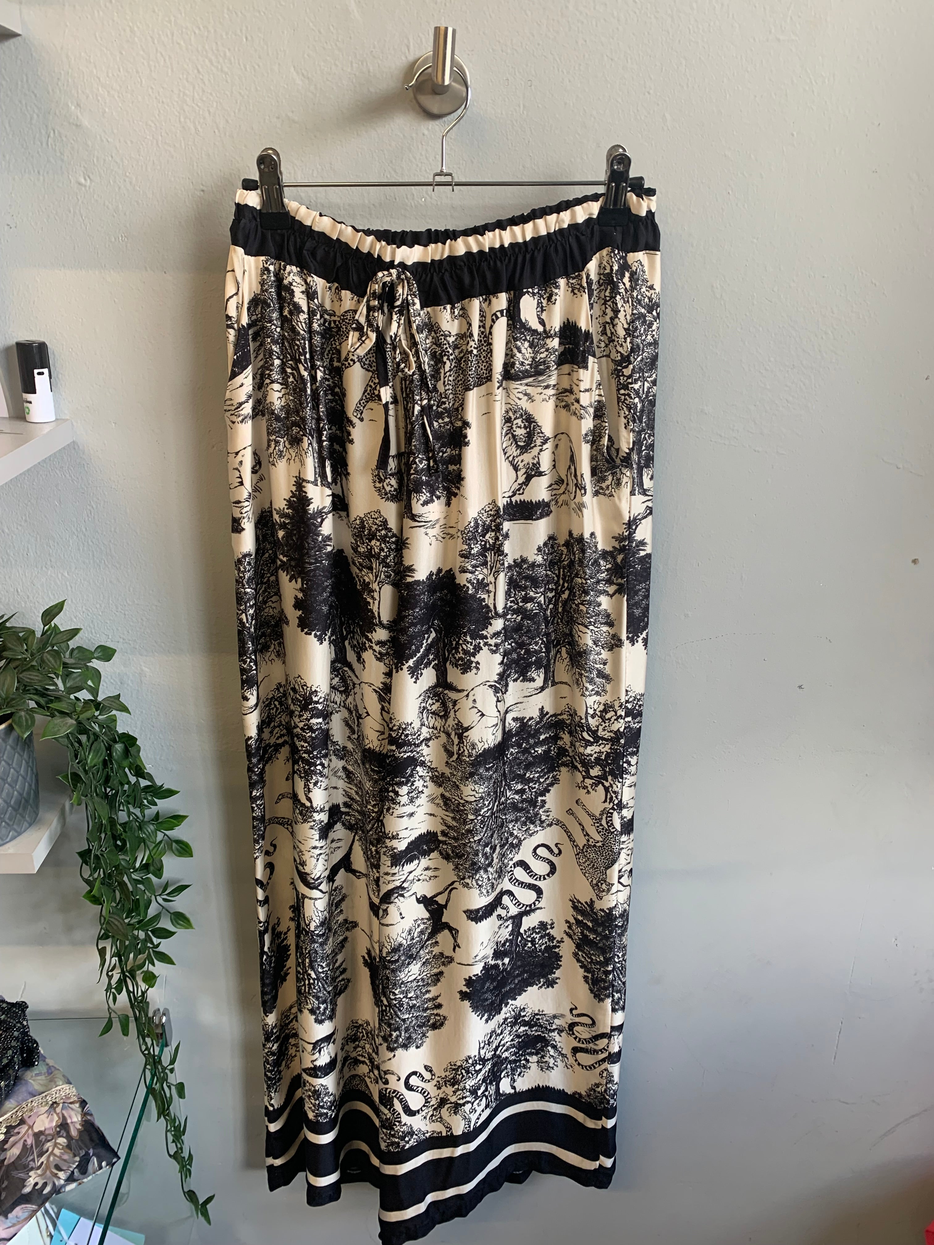 Safari print blouse and trouser set.