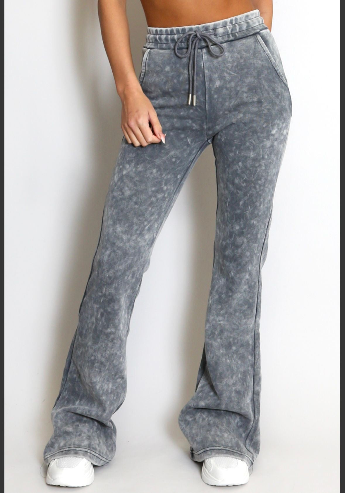 Acid wash fitted flared trousers