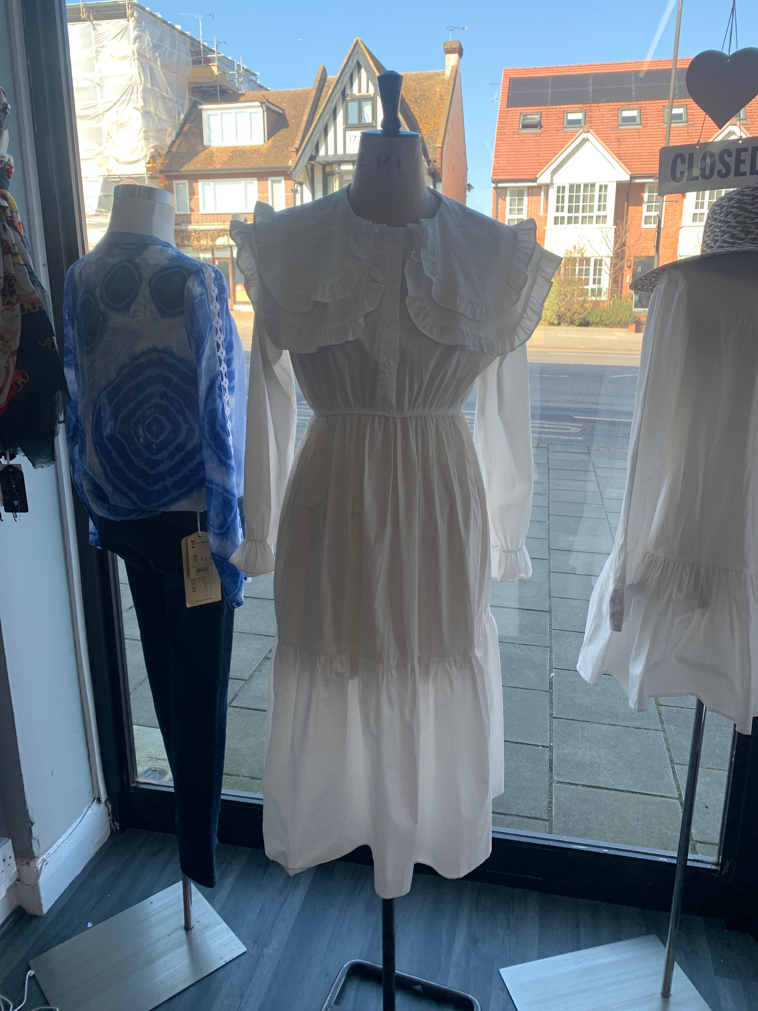 White frilly shirt dress