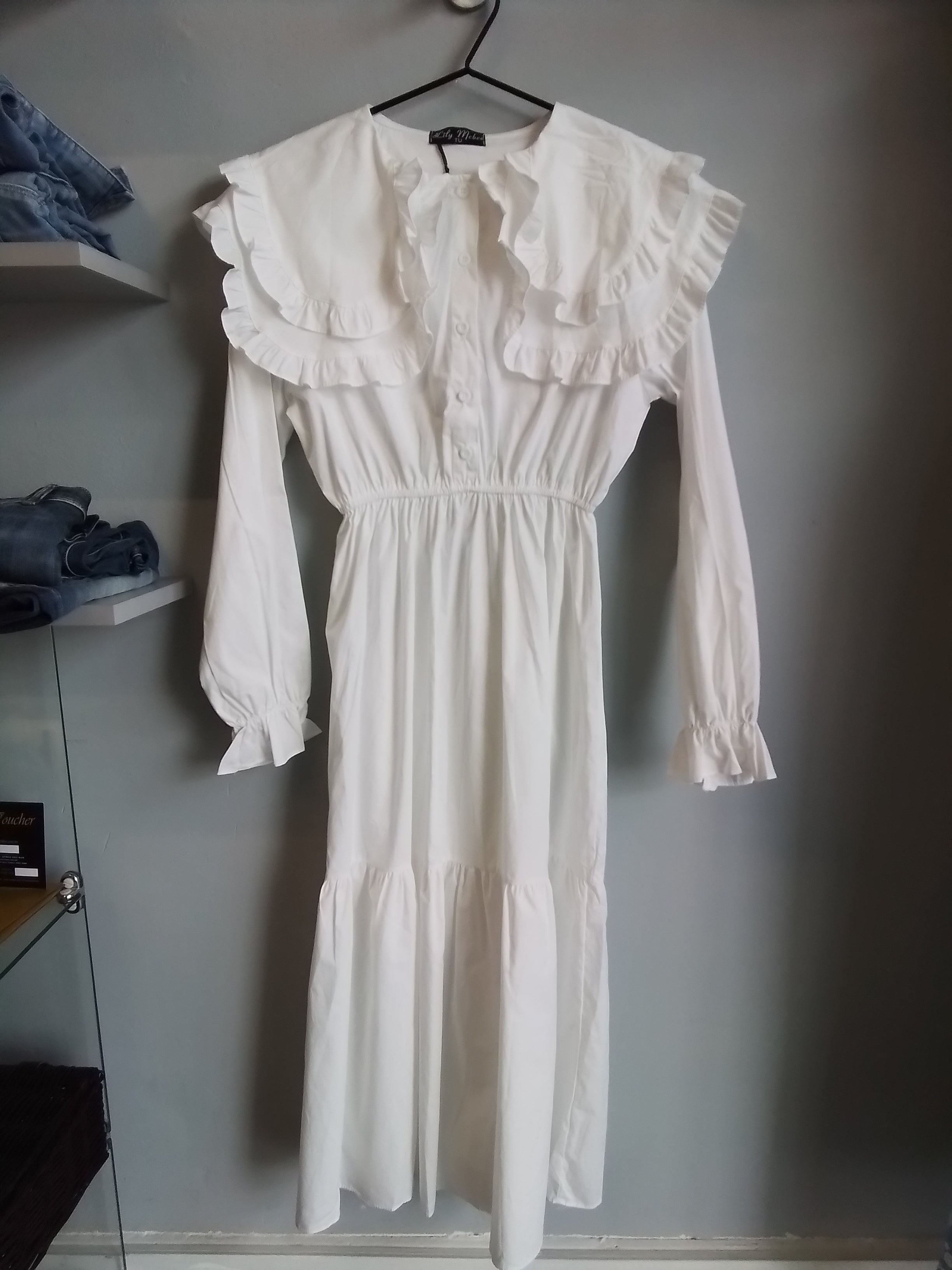 White frilly shirt dress