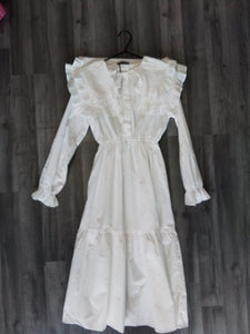 White frilly shirt dress